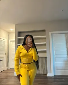 Women's yellow two-piece knitted tracksuit set with zip-up hoodie and high-waist pants