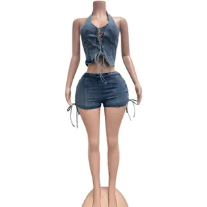 Trendy sexy blue washed denim two-piece set featuring halter top and lace-up shorts