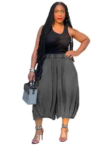 Fashionable women's trendy loose baggy harem pants with elastic waist in dark grey