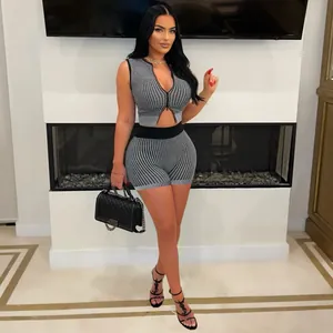 Elegant grey ribbed knit two-piece set with two-way zipper crop top and high-waist shorts