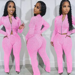 Detailed triple-angle view of pink ribbed knit two-piece set for stylish ladies