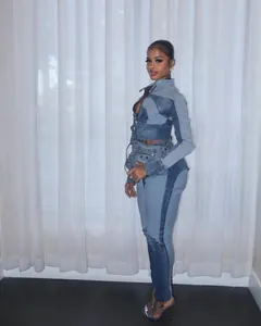 Detail view of model wearing a stylish patchwork denim two-piece set in light and dark blue