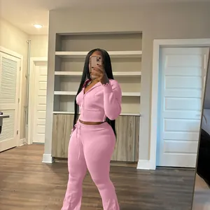 Detail shot showing texture of pink two-piece knit leisure sportswear set for women