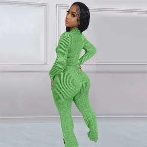 Detailed back view of women's green ribbed knit two-piece loungewear set with flared pants