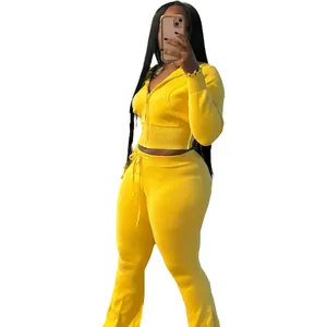 Vibrant yellow 2-piece knit sweater tracksuit set with cropped hoodie and flared pants
