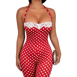Detail view of a sexy red polka dot halter jumpsuit with delicate white lace trim