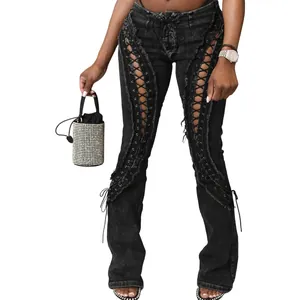 High-waisted black stretch denim jeans with edgy eyelet lace-up front details