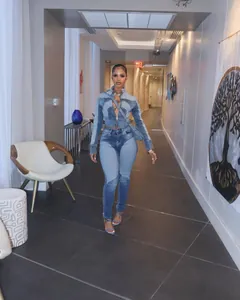 Stylish color block spliced denim jacket and skinny jeans two-piece set on a fashion model