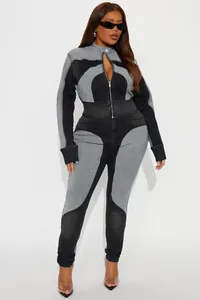 Detail of high-stretch patchwork denim two-piece set with color contrast