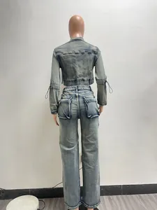 Back view of a stylish washed denim two-piece set featuring functional multi-pockets.