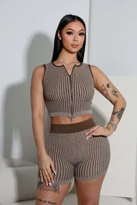 Detailed view of fashionable women's ribbed knit two-piece set with two-way zipper