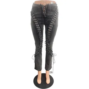 Stylish high waist black stretch denim pants with lace-up eyelet details and fringe