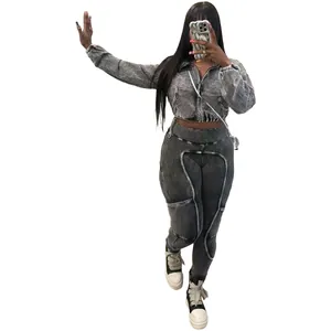 Trendy acid wash distressed two-piece ribbed set featuring a cropped jacket and pants.