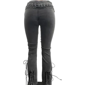 Detailed back view of high-waisted grey stretch denim pants featuring eyelet lace-up details