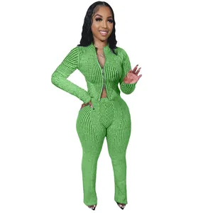 Detail view of women's green ribbed knit two-piece set with two-way zipper closure