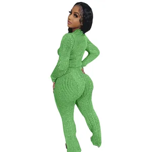 Back view of women's ribbed green knitted two-piece set showing fit and texture