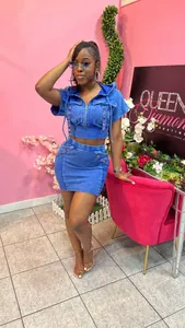 Stylish two-piece acid wash denim set featuring hooded crop top and mini skirt