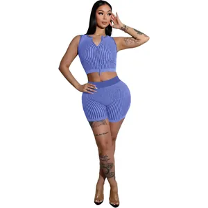 Full view of blue ribbed knit two-piece fashion set with functional two-way zipper