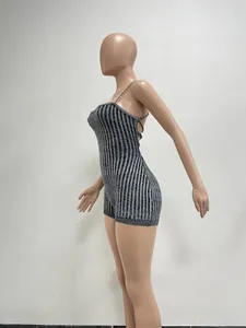 Side view of a sexy backless knitted jumpsuit featuring vertical black and white stripes