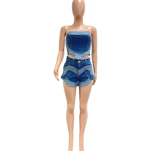 Detailed view of the women's two-piece washed denim set with a unique heart pattern design