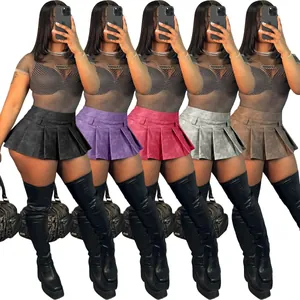 Detailed view of women's sexy pleated faux leather mini skirts in various colors