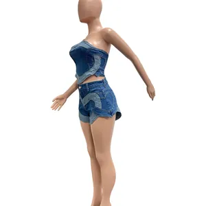 Side view detail of heart-shaped patchwork on washed denim tube top and shorts set