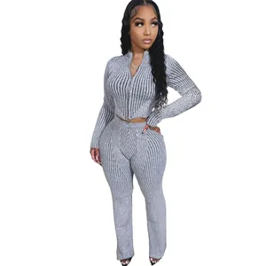 Trendy grey ribbed knit two-piece set featuring two-way zip jacket and matching pants