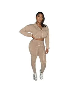 Vintage washed women's two-piece leisure set with cropped zip jacket and ribbed leggings