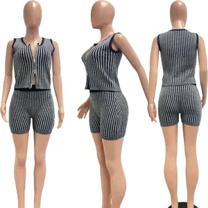 Detailed multi-angle view of striped two-piece knitted set with zipper top and shorts.