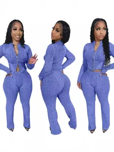 Stylish women's two-piece purple rib-knit set featuring two-way zipper top and pants