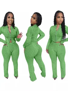 Women's two-piece green ribbed knit tracksuit set with two-way zipper top and long pants