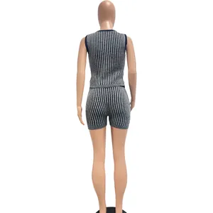 Detailed back view of women's fashion vertical striped two-piece knitted sweater set