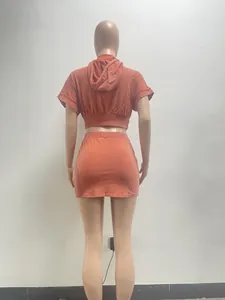 Back view detail of acid wash terracotta hooded crop top and mini skirt set