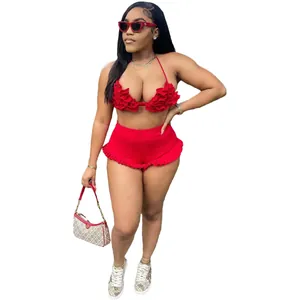 Sexy red two-piece ruffled halter neck top and matching high-waisted shorts set for women