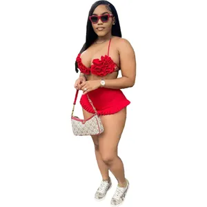 Full body view of sexy red halter top and ruffled high waist shorts two-piece set