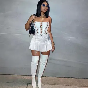 Urban fashion sexy white sleeveless eyelet lace-up dress with pleated mini skirt
