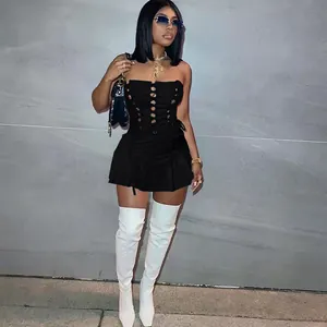 Detailed view of a sexy black hollow-out eyelet lace-up strapless mini dress for women