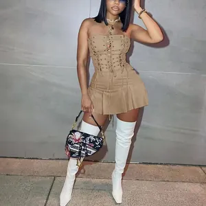 Detailed view of sexy khaki sleeveless mini dress featuring lace-up eyelet hollow design