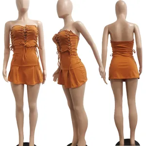 Detailed view of ginger lace-up sleeveless mini dress from three different angles.
