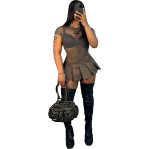 Women's sexy brown pleated leather-like mini skirt with mesh top and black handbag