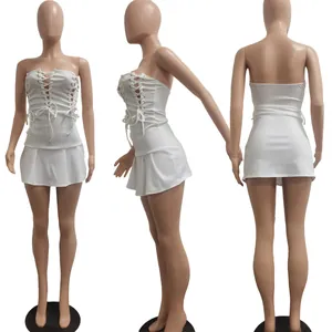 Sexy white strapless lace-up eyelet mini dress shown from front, side, and back angles.