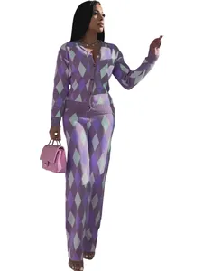Completo due pezzi in maglia a rombi con cardigan e pantaloni eleganti da donna