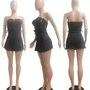 Detail view of black sleeveless dress with lace-up eyelet front from three angles