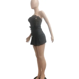 Macro view of black sleeveless mini dress featuring sexy side eyelet lace-up design detail