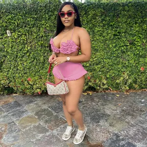 Trendy pink two-piece ruffle halter top and shorts set for summer urban streetwear style