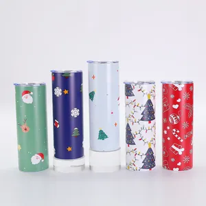 Detailed view of five Christmas themed 20oz vacuum skinny tumblers with holiday prints