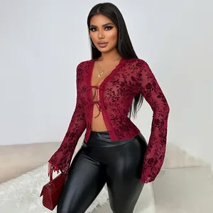 Elegant burgundy floral mesh top with ruffle trumpet sleeves and front tie closure