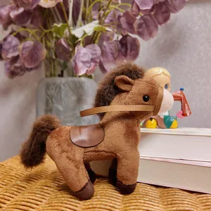 Adorable brown plush horse toy with a leather saddle standing on a wicker surface