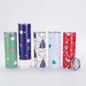 Collection of five 20oz Christmas themed vacuum insulated tumblers with clear lids