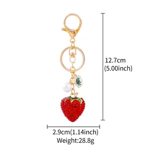 Detailed size and weight guide for the cute red rhinestone strawberry keychain pendant